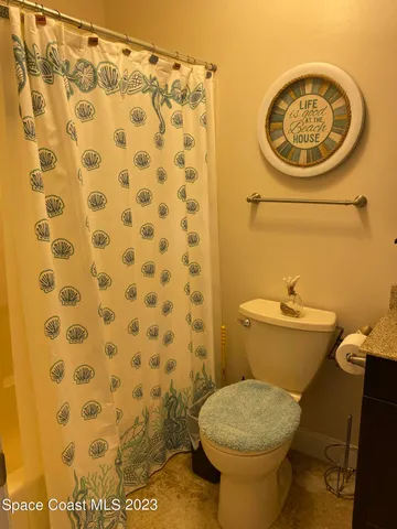 a bathroom with a toilet and a sink