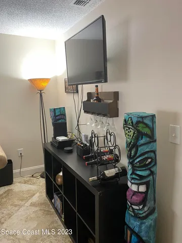 a view of a workspace with furniture