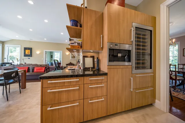 a kitchen with sink and cabinets