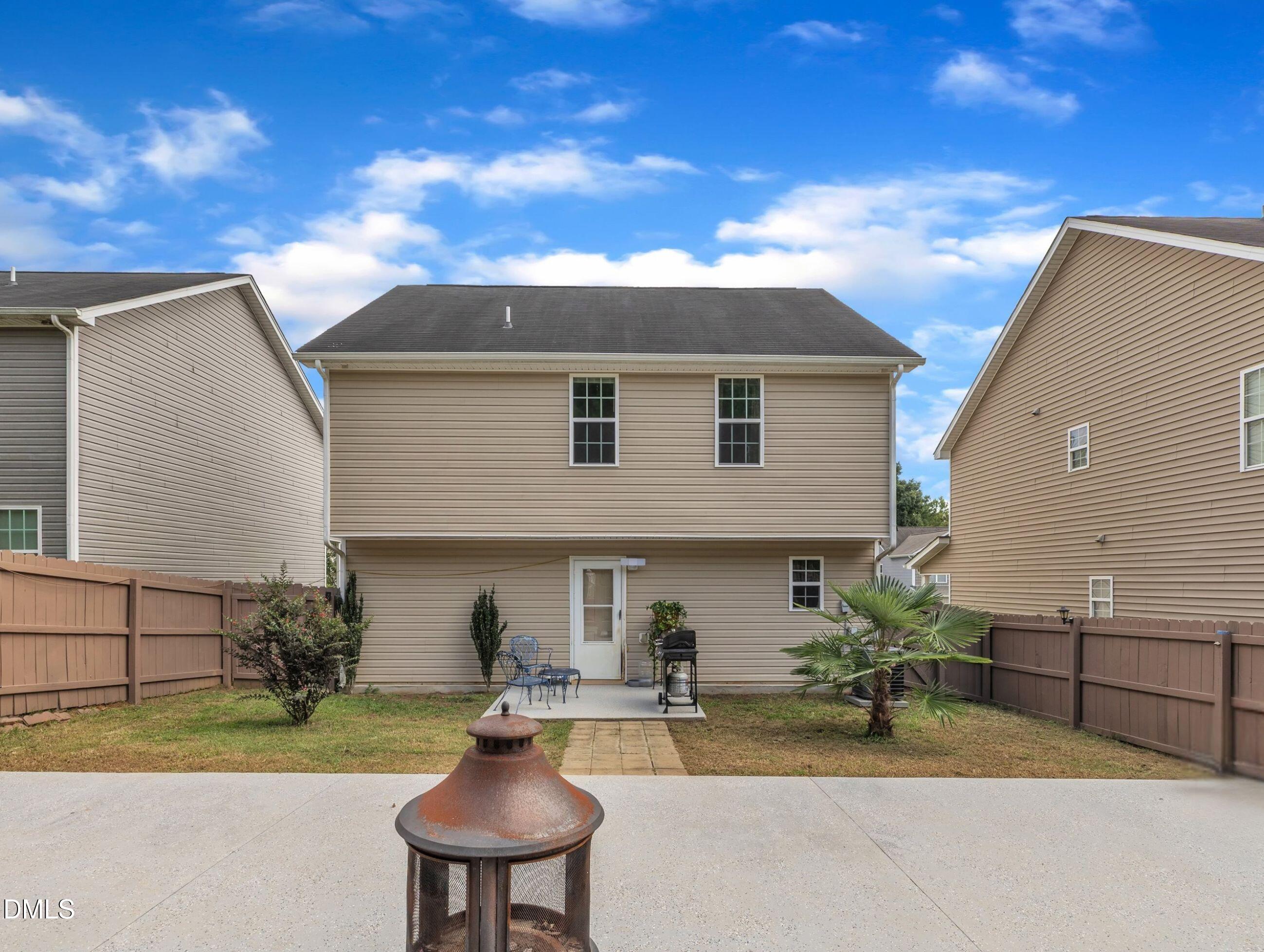 2816 Erinridge Road Raleigh, NC 27610 - Photo 13 of 20 a view of a house with backyard and sitting area