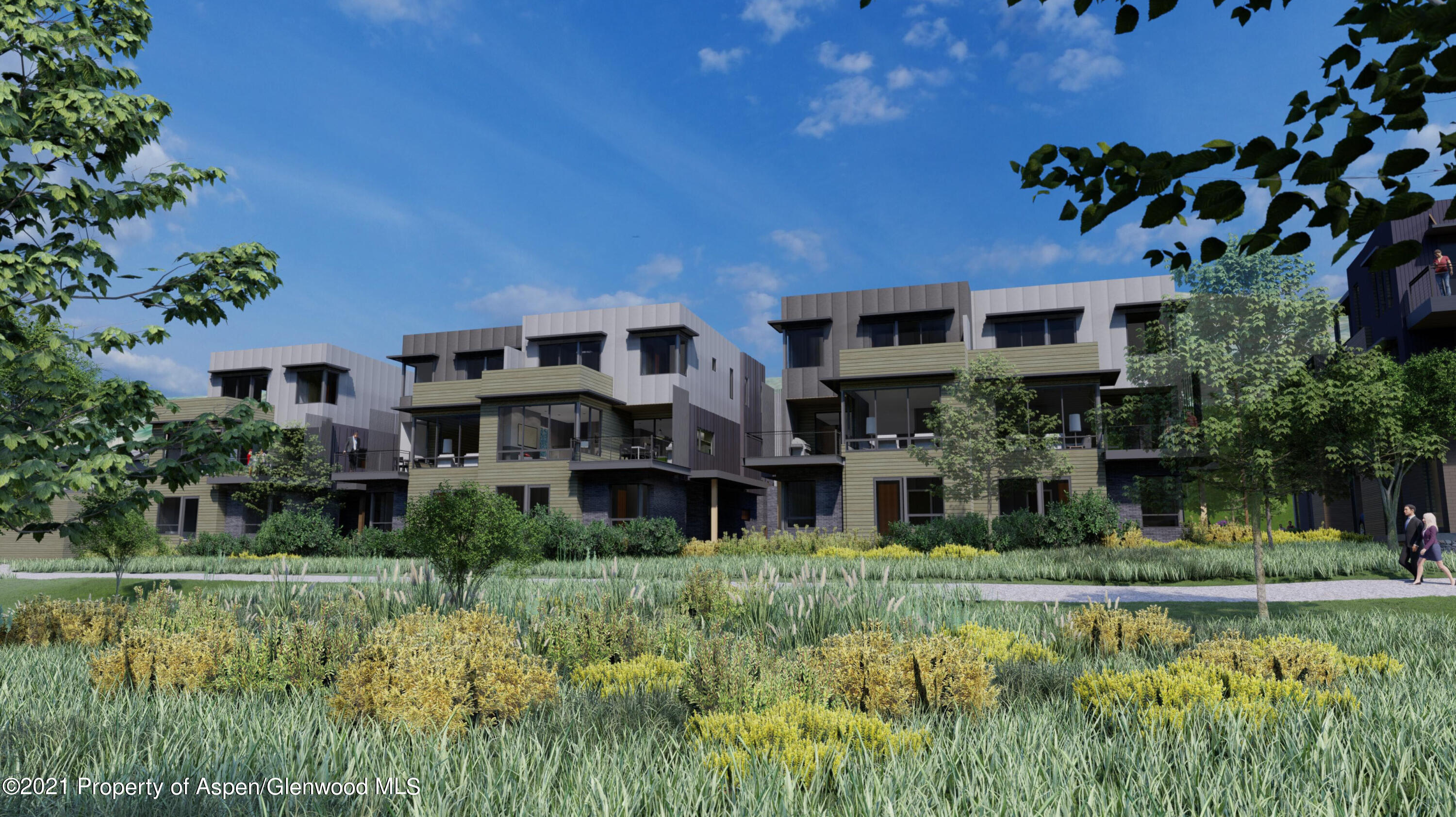 22852 Two Rivers Road, Unit R2 Basalt, CO 81621 - Photo 2 of 12 a front view of a house with a yard