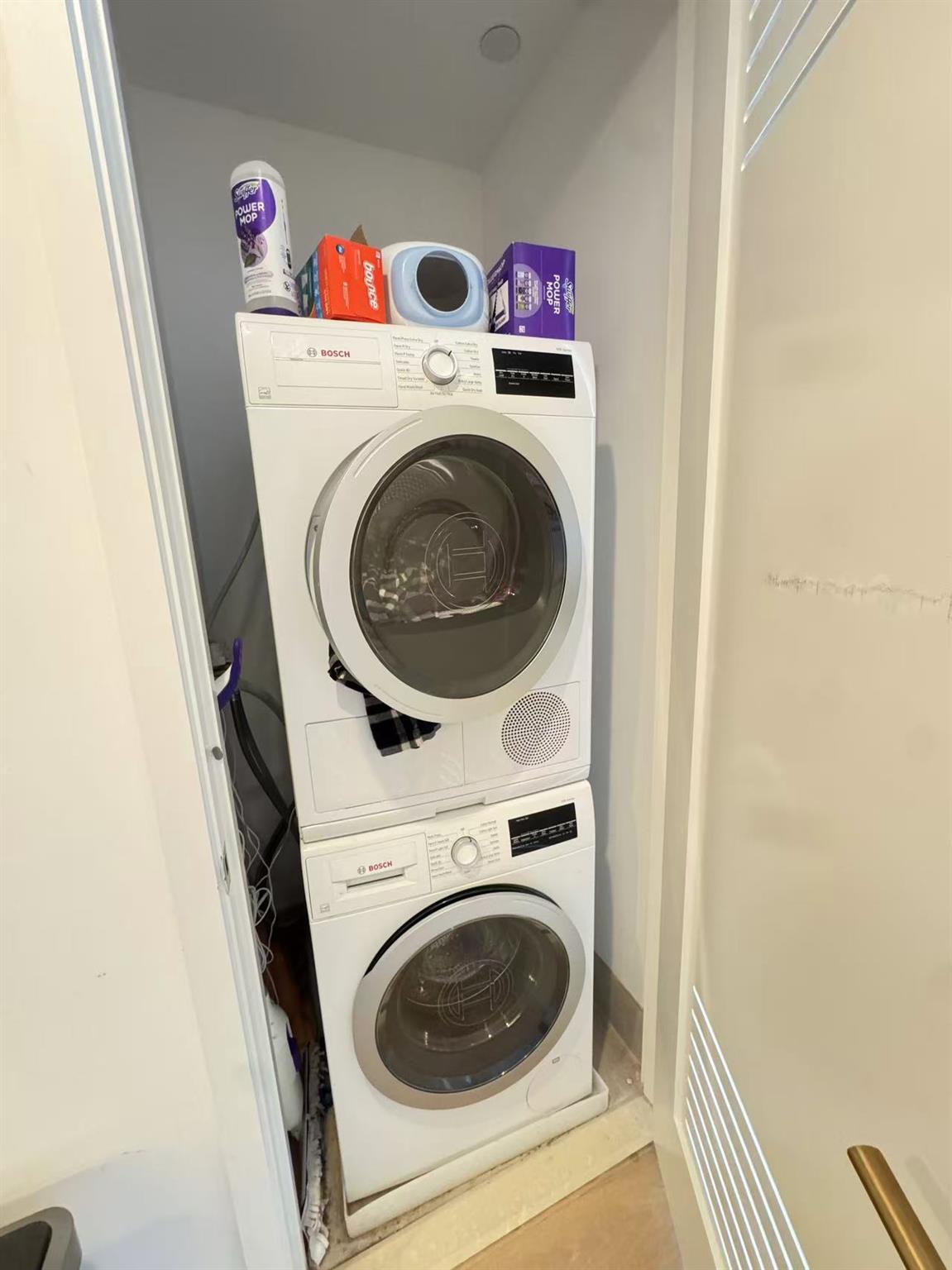 3 Court Square, Unit 3001 Queens, NY 11101 - Photo 12 of 13 a utility room with dryer and washer