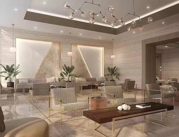 a living room with couches and kitchen view with wooden floor