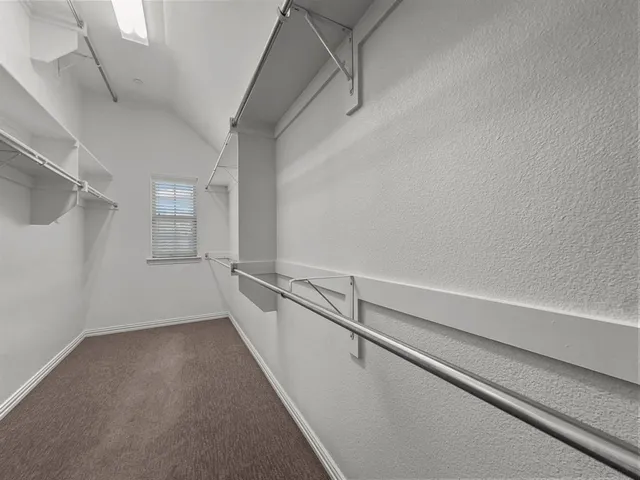 a view of a walk in closet