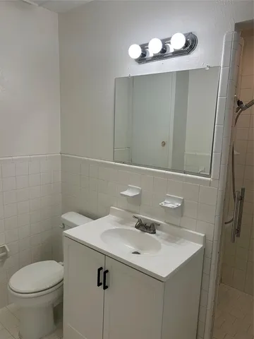 a bathroom with a sink and a toilet