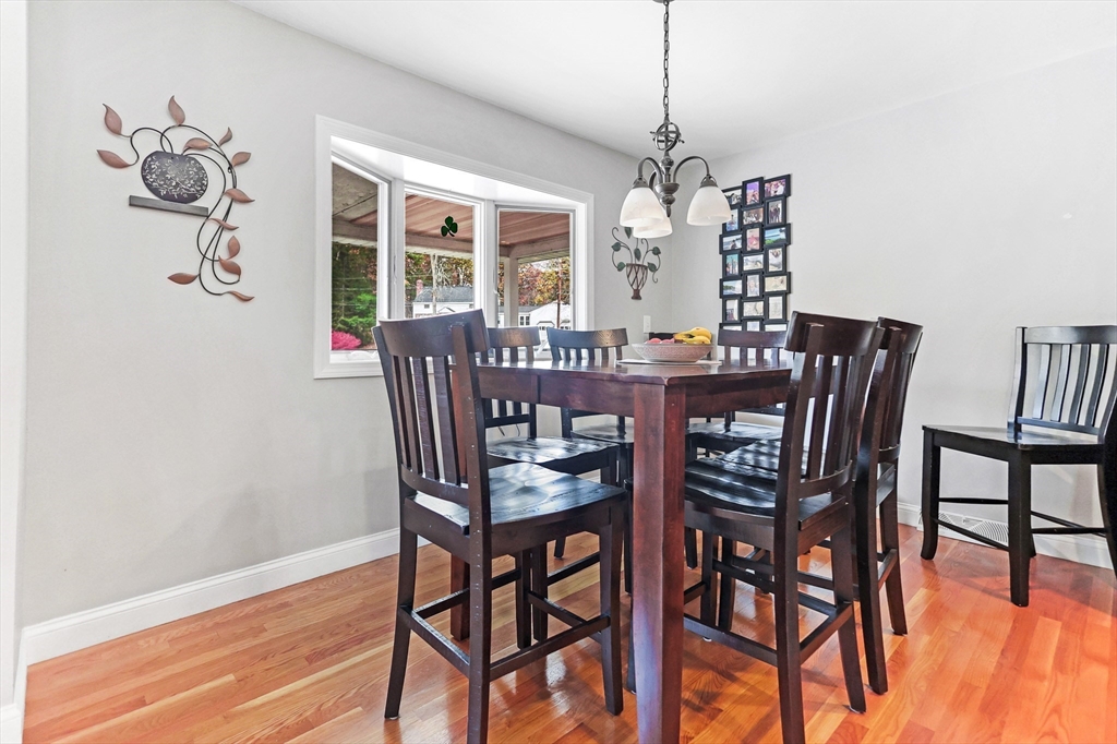 86 Butternut Lane Methuen, MA 01844 - Photo 13 of 32 a view of a dining room with furniture window and wooden floor