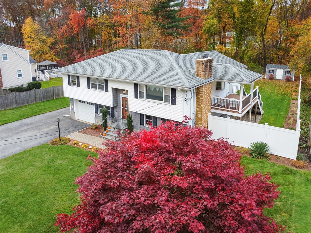 86 Butternut Lane Methuen, MA 01844 - Photo 2 of 32 a view of a house with a yard