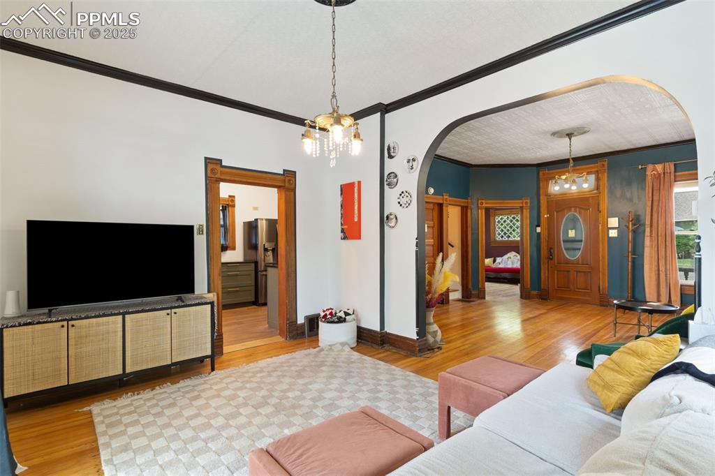 732 Rudd Avenue Canon City, CO 81212 - Photo 13 of 36 a living room with furniture and a flat screen tv