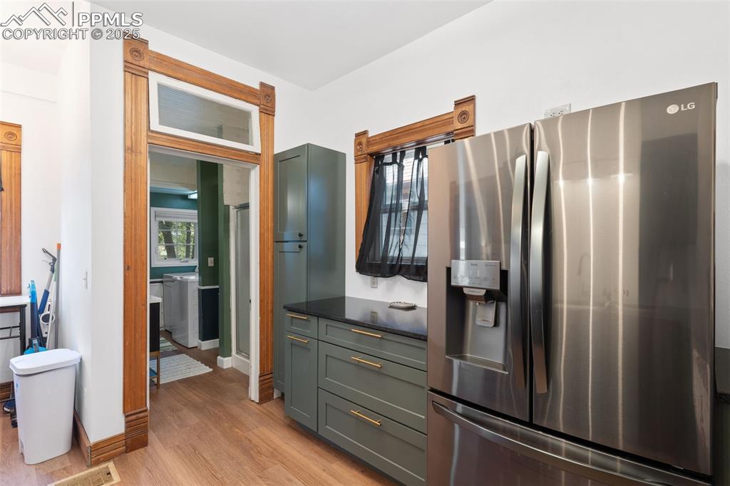 732 Rudd Avenue Canon City, CO 81212 - Photo 17 of 36 a kitchen with stainless steel appliances granite countertop a refrigerator and a sink