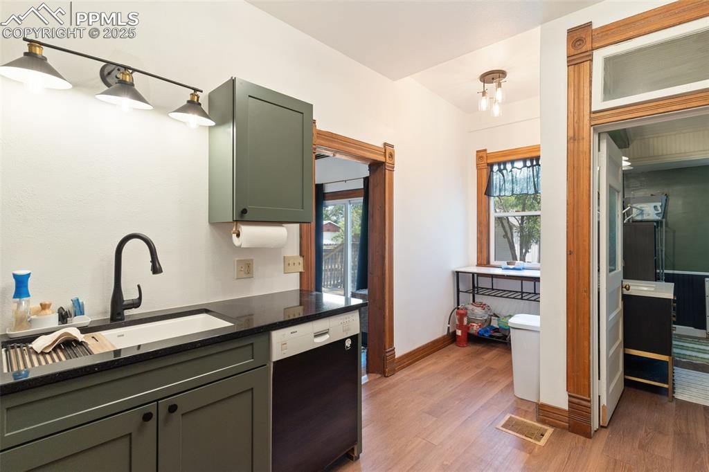 732 Rudd Avenue Canon City, CO 81212 - Photo 18 of 36 a kitchen with a sink and cabinets