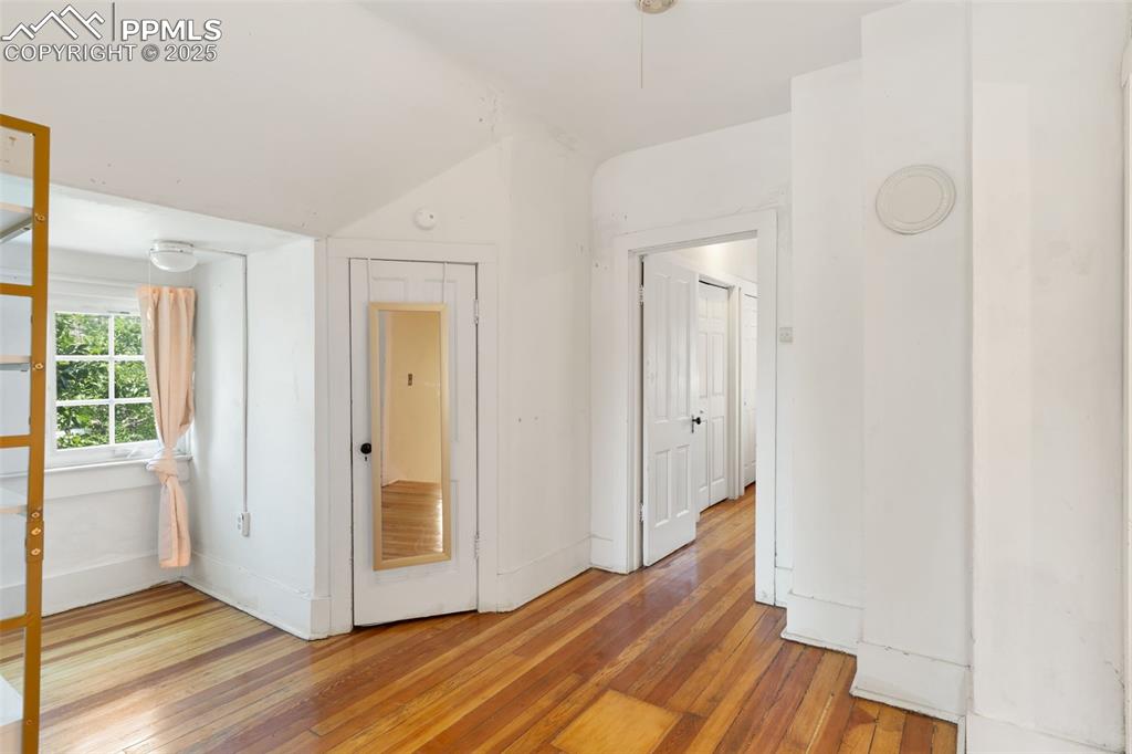 732 Rudd Avenue Canon City, CO 81212 - Photo 23 of 36 a view of a room with wooden floor and window