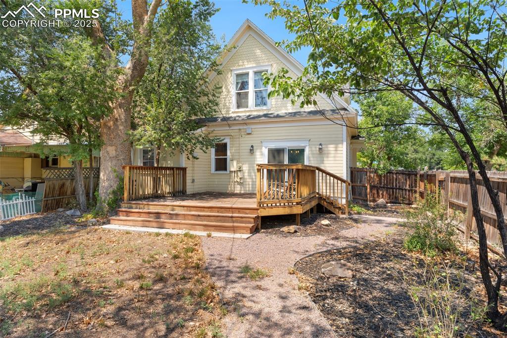 732 Rudd Avenue Canon City, CO 81212 - Photo 35 of 36 a view of house with outdoor space and trees in the background