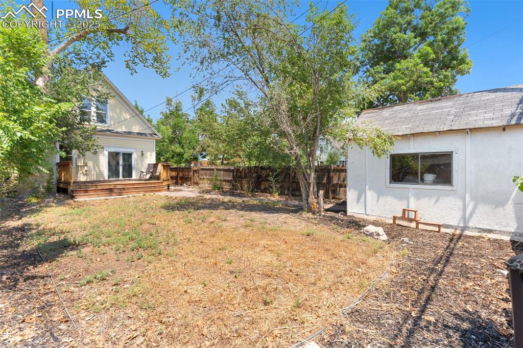 732 Rudd Avenue Canon City, CO 81212 - Photo 36 of 36 a backyard of a house with table and chairs