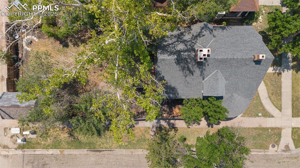 732 Rudd Avenue Canon City, CO 81212 - Photo 5 of 36 an aerial view of a house with a yard basket ball court and outdoor seating