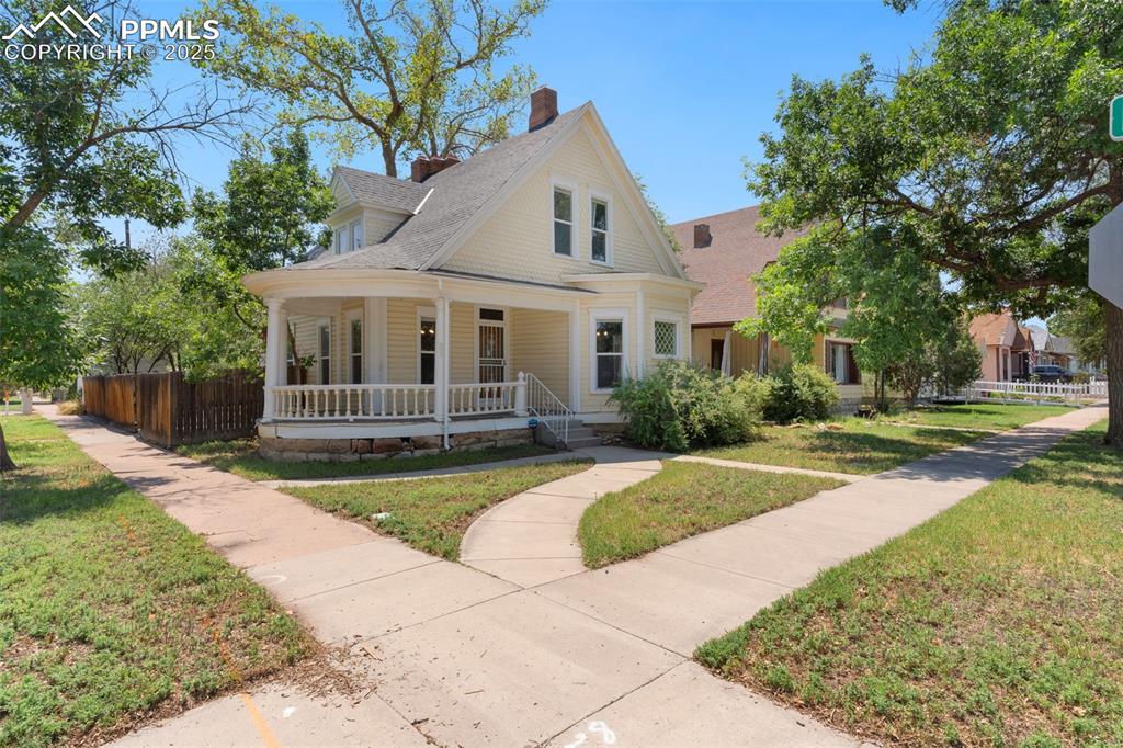 732 Rudd Avenue Canon City, CO 81212 - Photo 7 of 36 a front view of a house with a yard