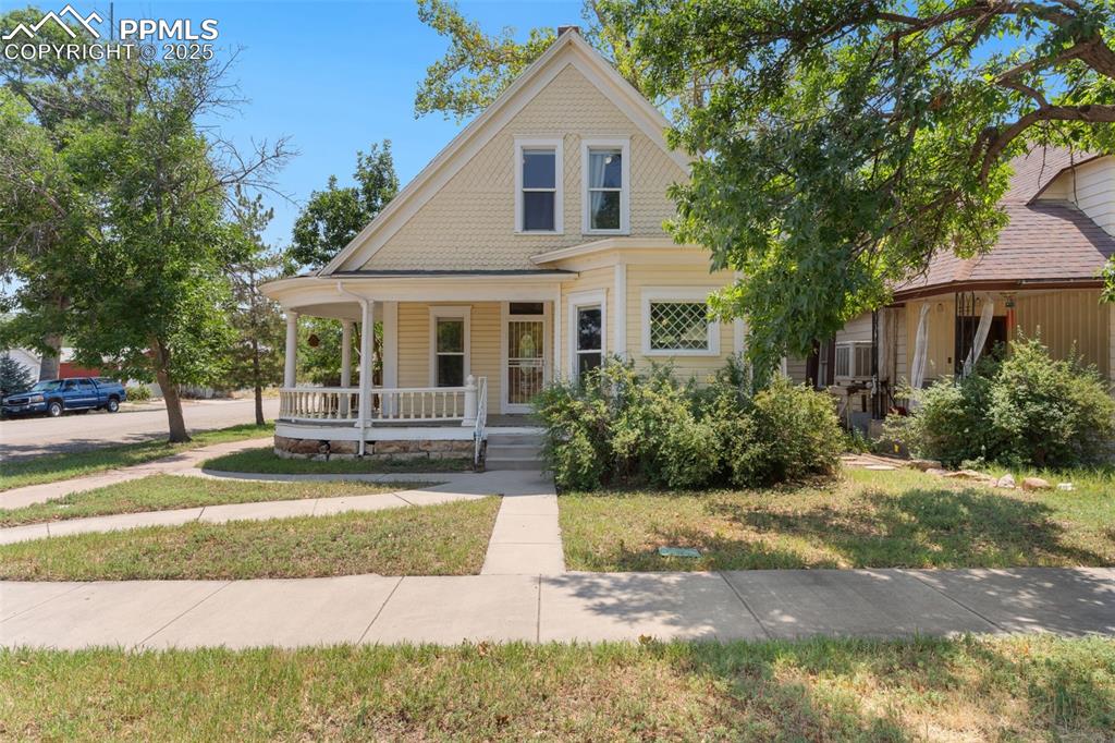 732 Rudd Avenue Canon City, CO 81212 - Photo 8 of 36 a front view of a house with a yard