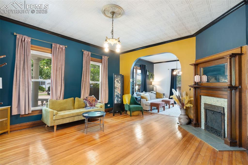 732 Rudd Avenue Canon City, CO 81212 - Photo 10 of 36 a living room with furniture and a fireplace
