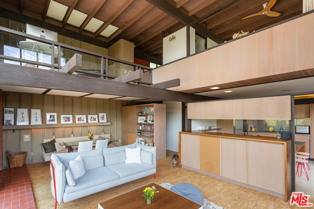 1617 Pleasant Way Pasadena, CA 91105 - Photo 3 of 19 a living room with stainless steel appliances kitchen island granite countertop furniture and a rug
