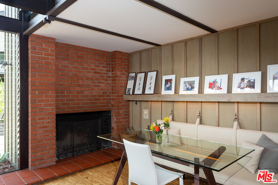 1617 Pleasant Way Pasadena, CA 91105 - Photo 5 of 19 a living room with furniture a fireplace and a window