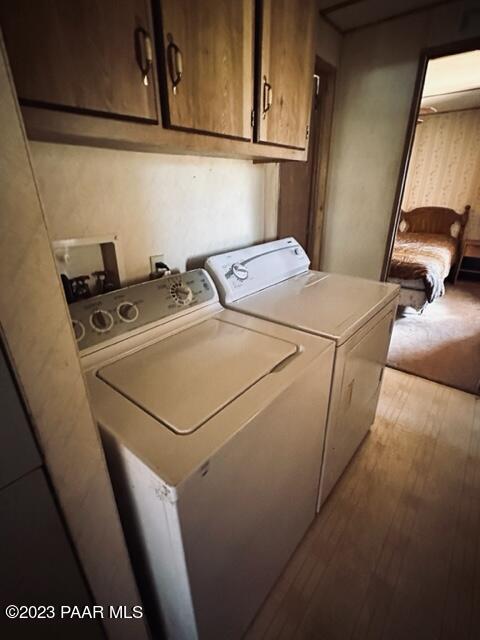 32 Stewart Road Seligman, AZ 86337 - Photo 18 of 62 a utility room with dryer and washer