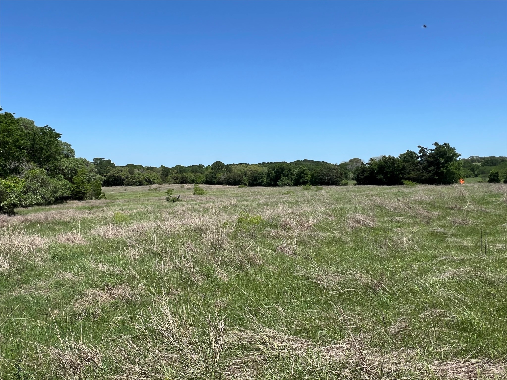 0 Fm 1579 And Langdon Road Schulenburg, TX 78956 - Photo 6 of 12 a view of a lake with houses in the background
