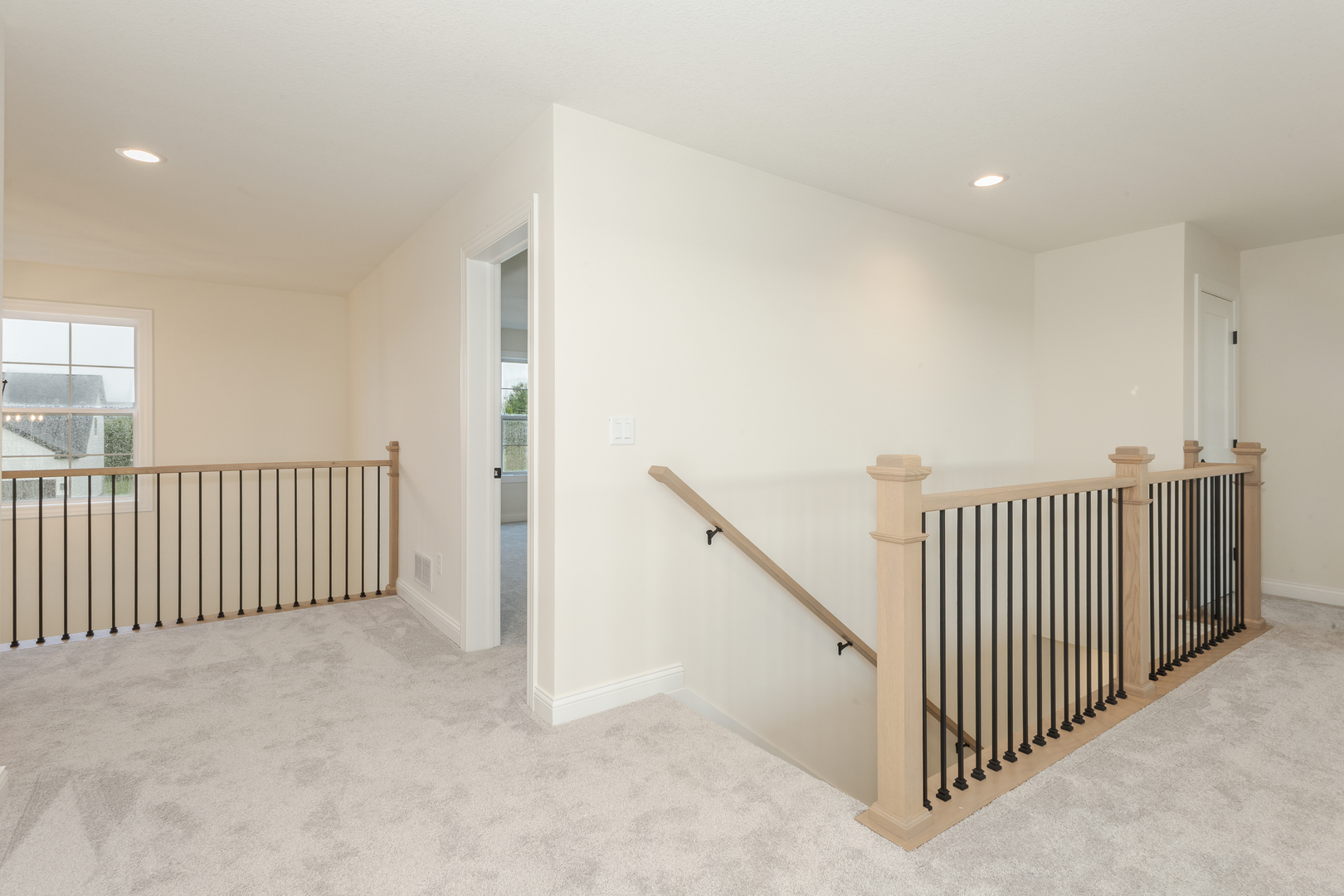 1313 Woodbine Road Bloomington, IL 61704 - Photo 12 of 67 a view of a hallway with closet