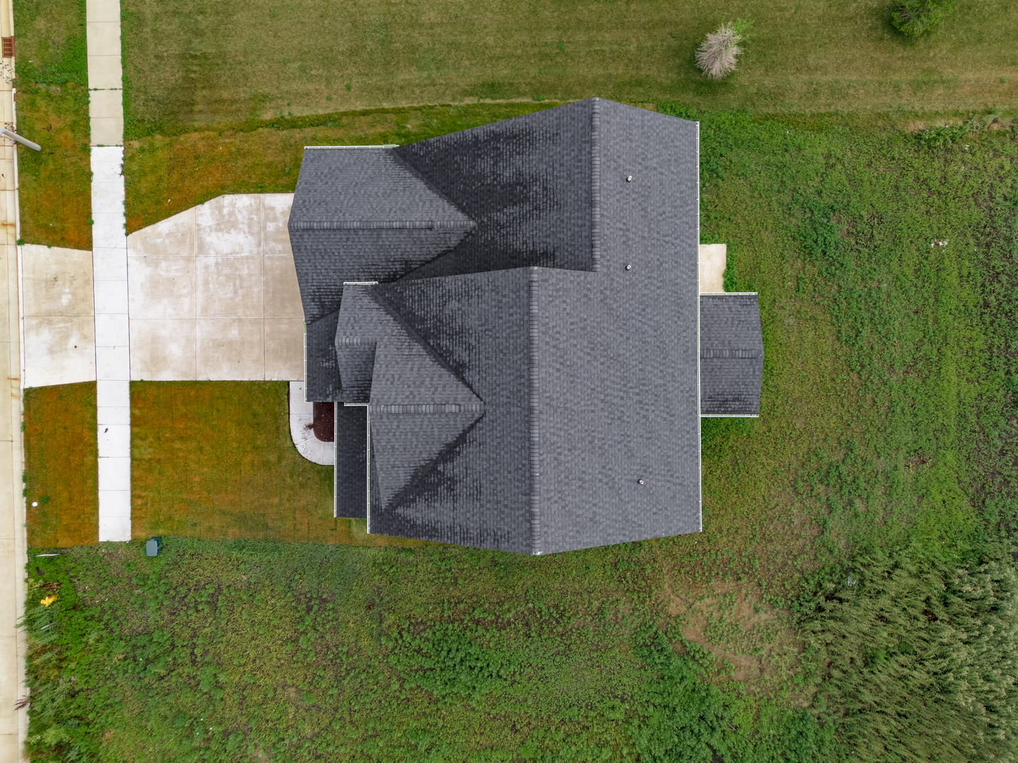 1313 Woodbine Road Bloomington, IL 61704 - Photo 53 of 67 an aerial view of a house with a yard