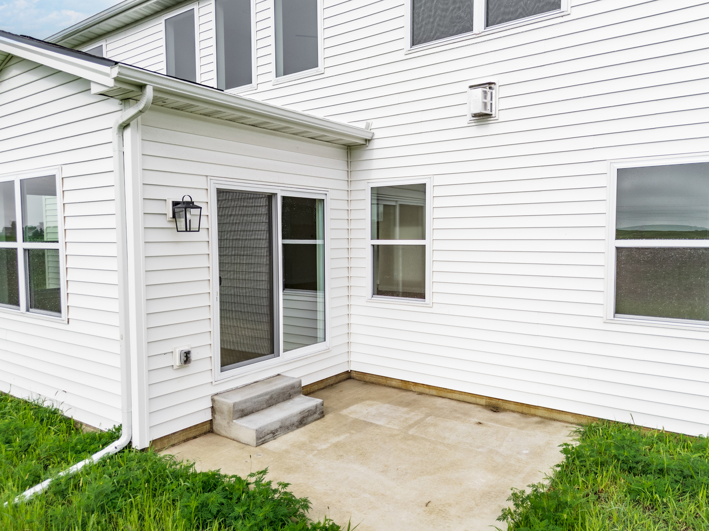 1313 Woodbine Road Bloomington, IL 61704 - Photo 56 of 67 a view of a house with white door