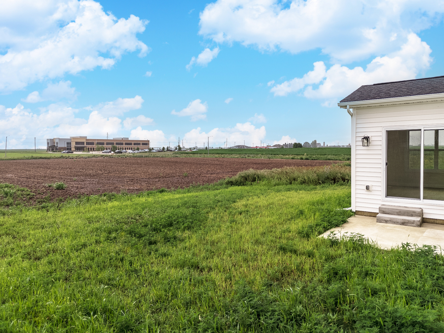 1313 Woodbine Road Bloomington, IL 61704 - Photo 57 of 67 a view of a yard with an outdoor space