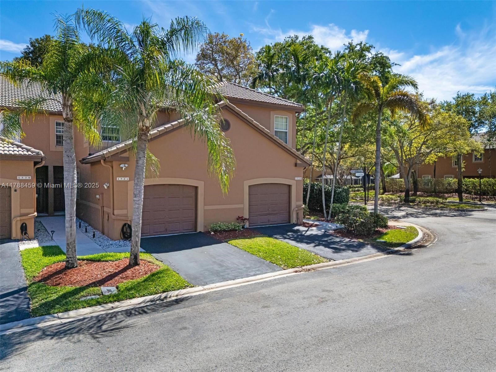 1524 Coronado Road, Unit 535 Fort Lauderdale, FL 33327 - Photo 3 of 54 a view of a house with backyard and sitting area