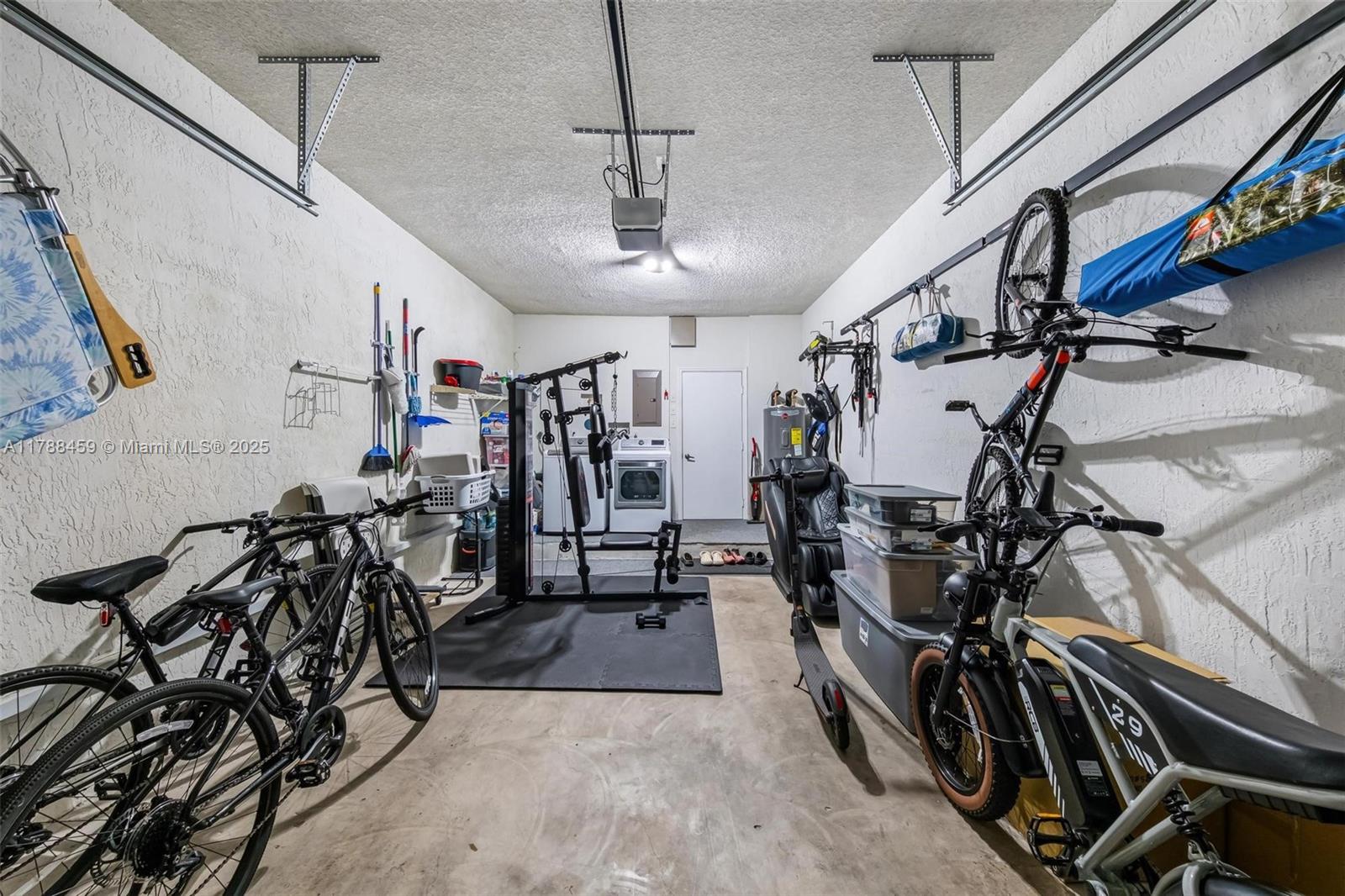 1524 Coronado Road, Unit 535 Fort Lauderdale, FL 33327 - Photo 40 of 54 a view of a room with gym equipment