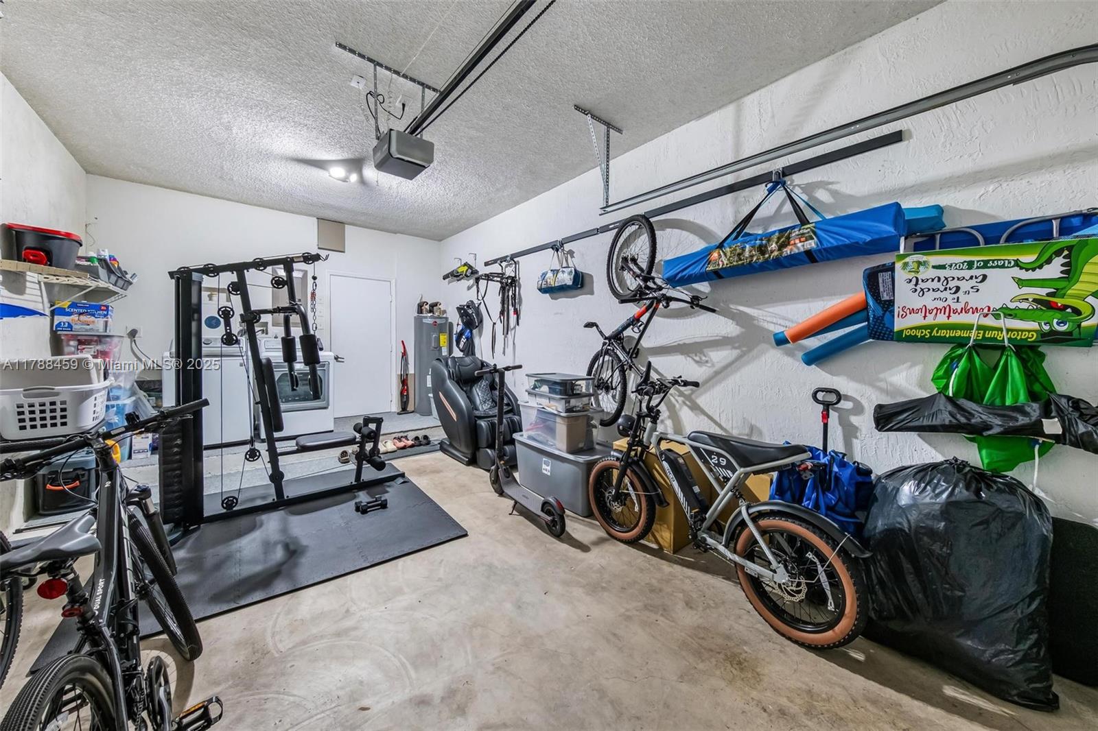 1524 Coronado Road, Unit 535 Fort Lauderdale, FL 33327 - Photo 42 of 54 a view of a room with gym equipment