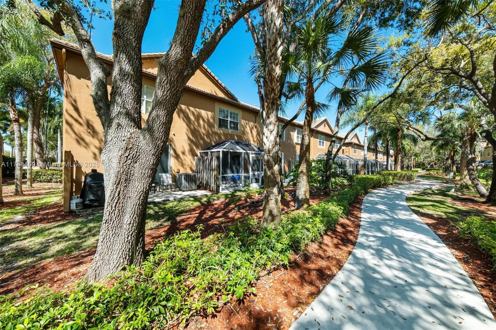 1524 Coronado Road, Unit 535 Fort Lauderdale, FL 33327 - Photo 45 of 54 a view of a pathway with a yard