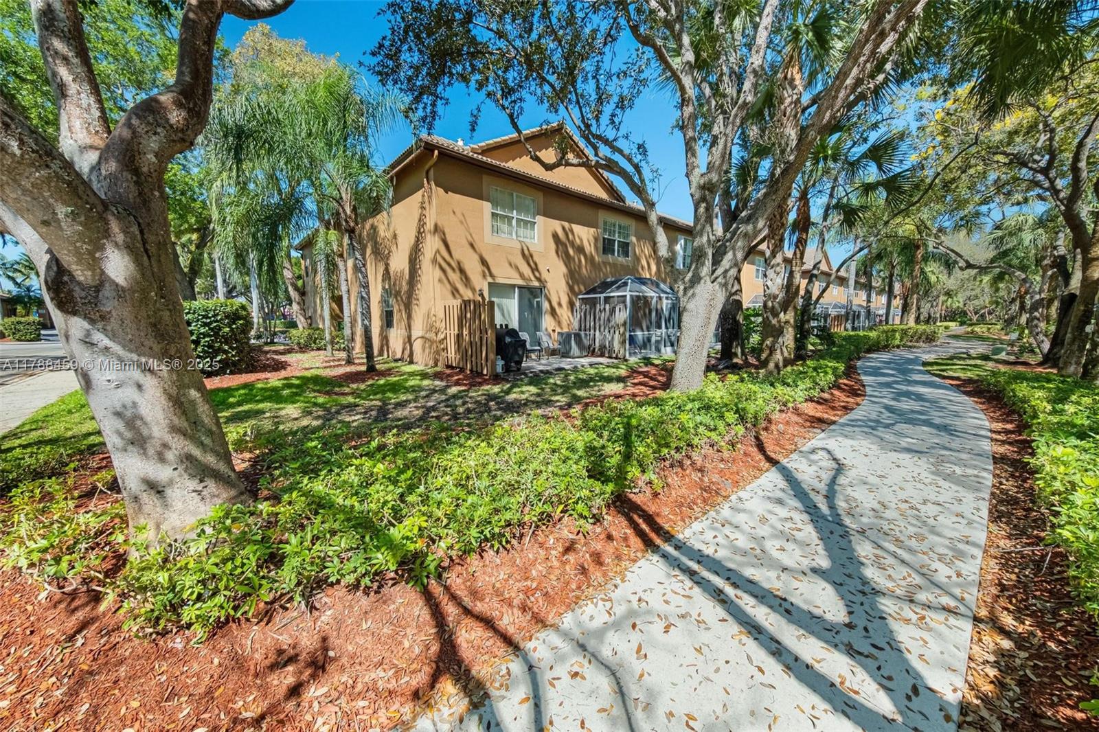 1524 Coronado Road, Unit 535 Fort Lauderdale, FL 33327 - Photo 46 of 54 a view of a house with a yard