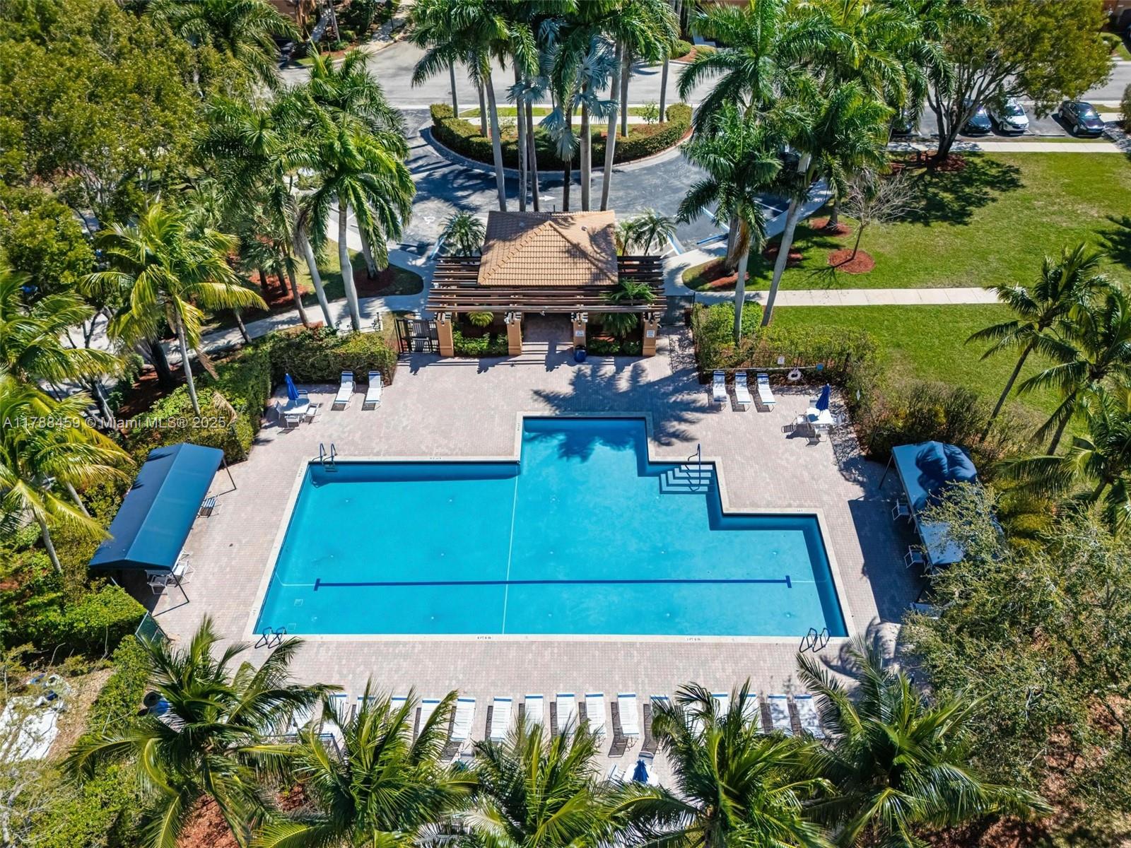 1524 Coronado Road, Unit 535 Fort Lauderdale, FL 33327 - Photo 48 of 54 an aerial view of a house with swimming pool garden and patio