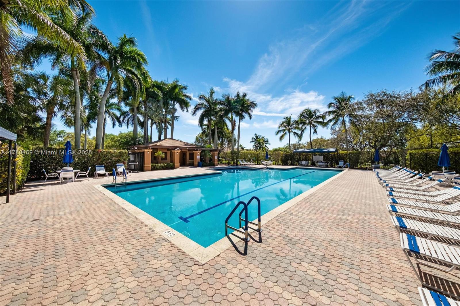 1524 Coronado Road, Unit 535 Fort Lauderdale, FL 33327 - Photo 51 of 54 a view of outdoor space with swimming pool and seating