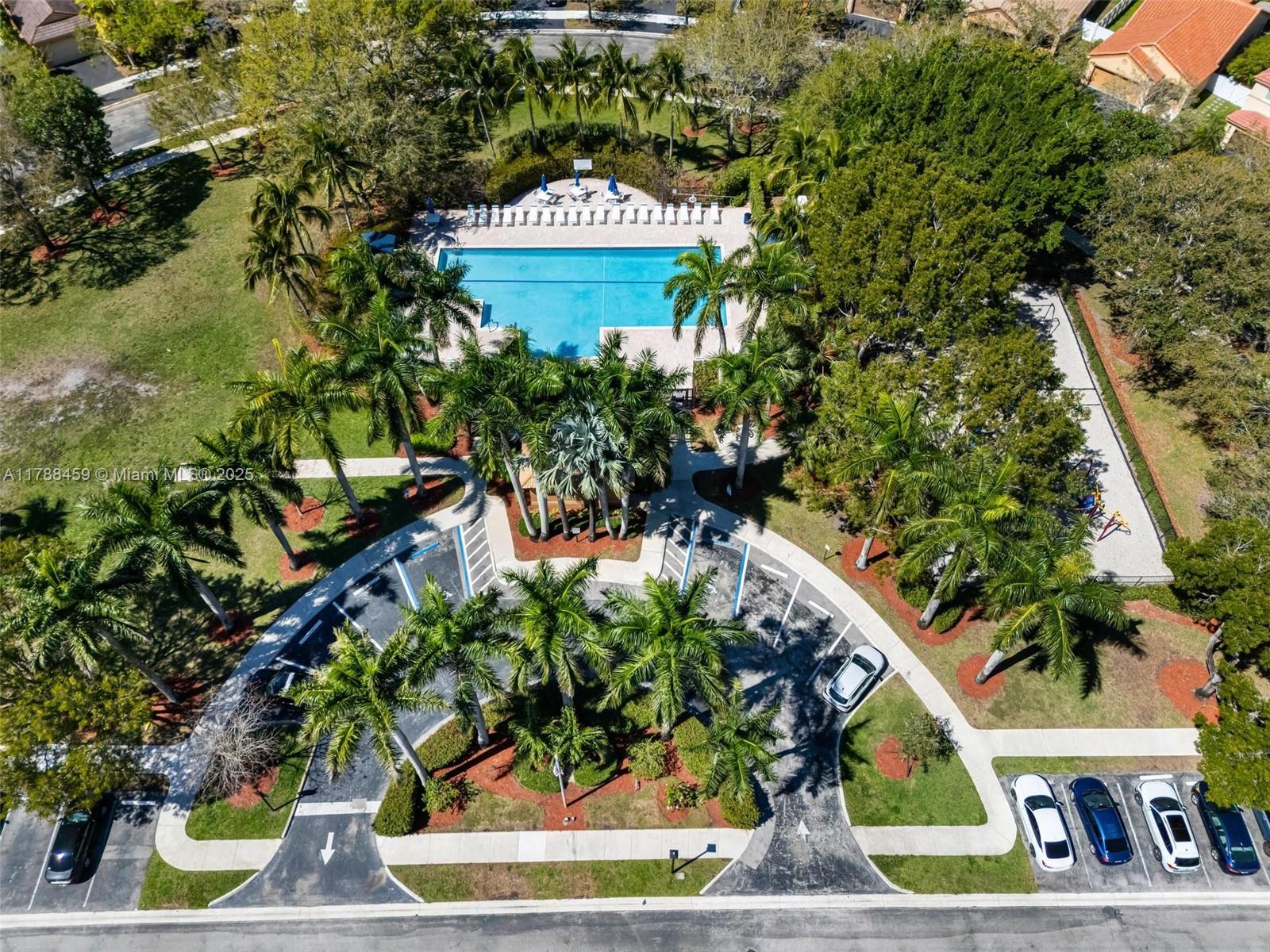 1524 Coronado Road, Unit 535 Fort Lauderdale, FL 33327 - Photo 53 of 54 a view of outdoor space with a garden and plants