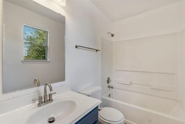 a view of a deck with a table and chairs with wooden floor