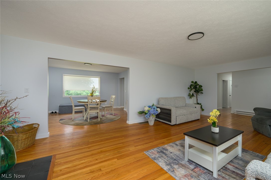 3072 Tallmadge Road Kent, OH 44240 - Photo 14 of 33 hardwood floors and fireplace
