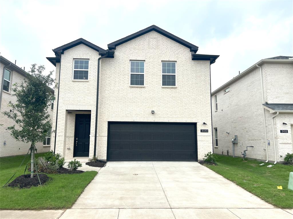 a front view of house with yard