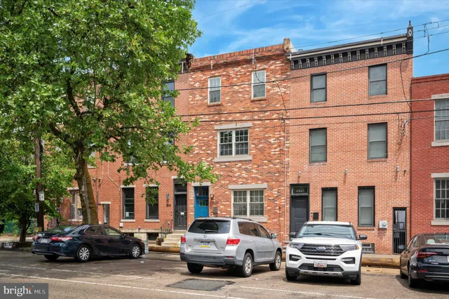 a car parked in front of a building