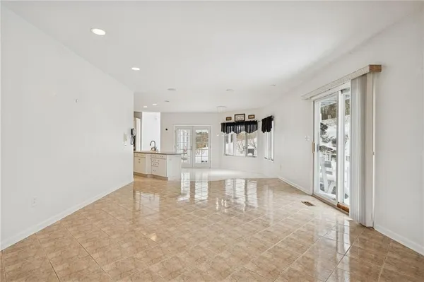 a view of an empty room and window