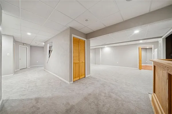 a view of a livingroom with a kitchen
