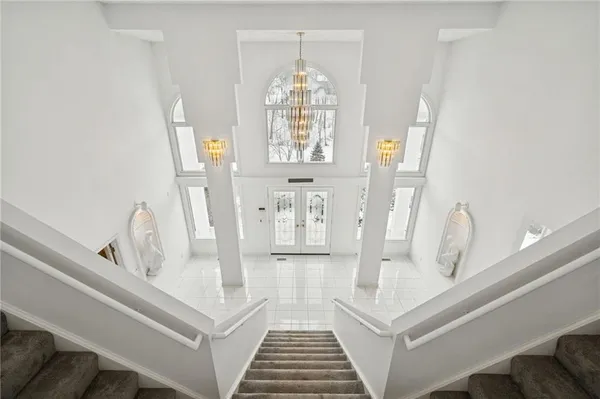 a view of a hallway with windows