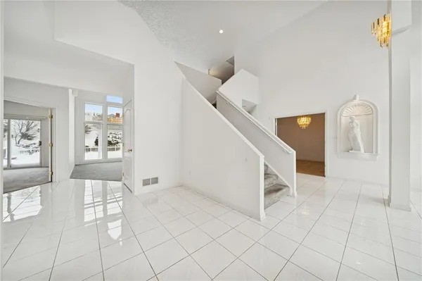 a view of an entryway with stairs