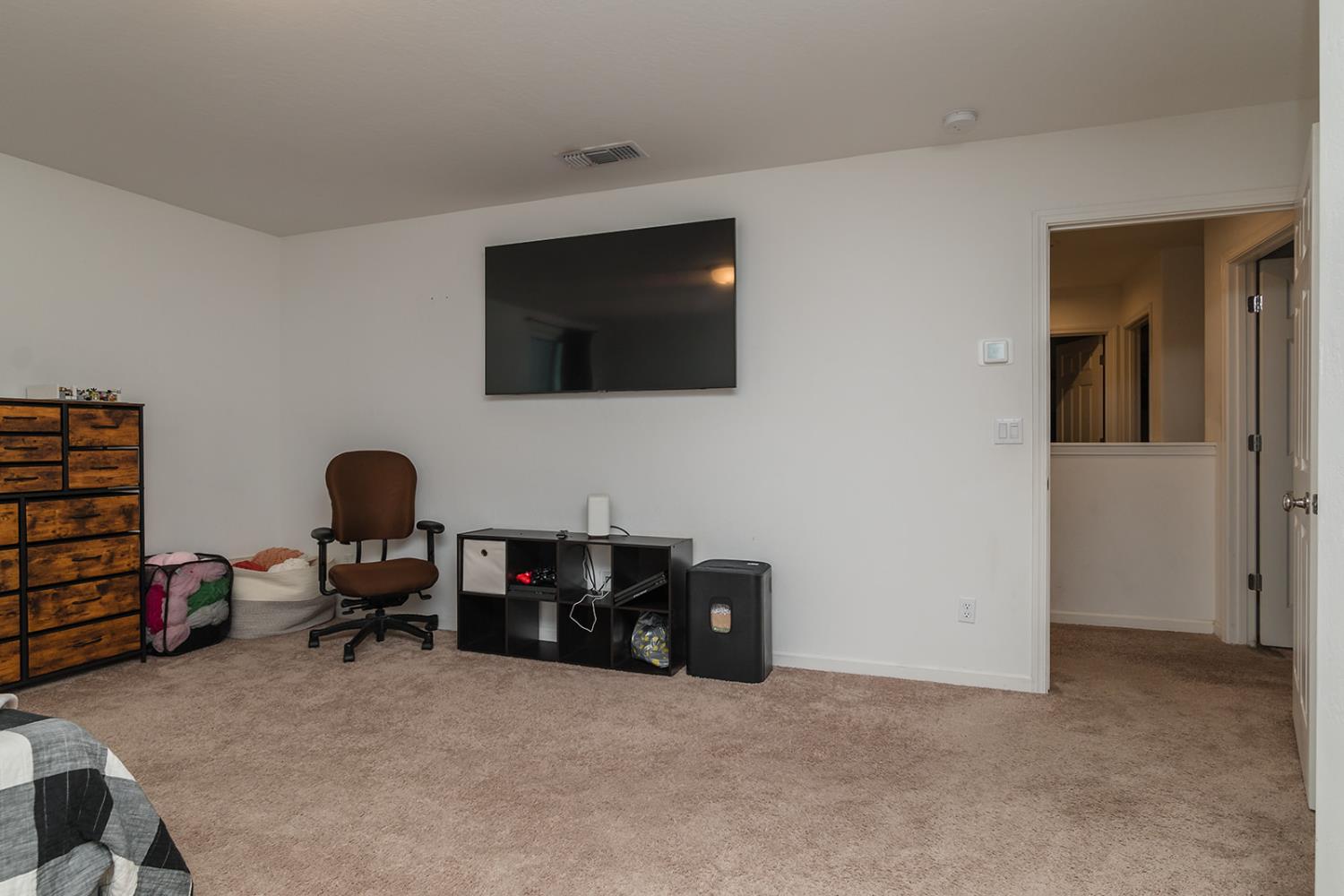 1945 East Gum Avenue Reedley, CA 93654 - Photo 15 of 31 a view of a livingroom with workspace and a window