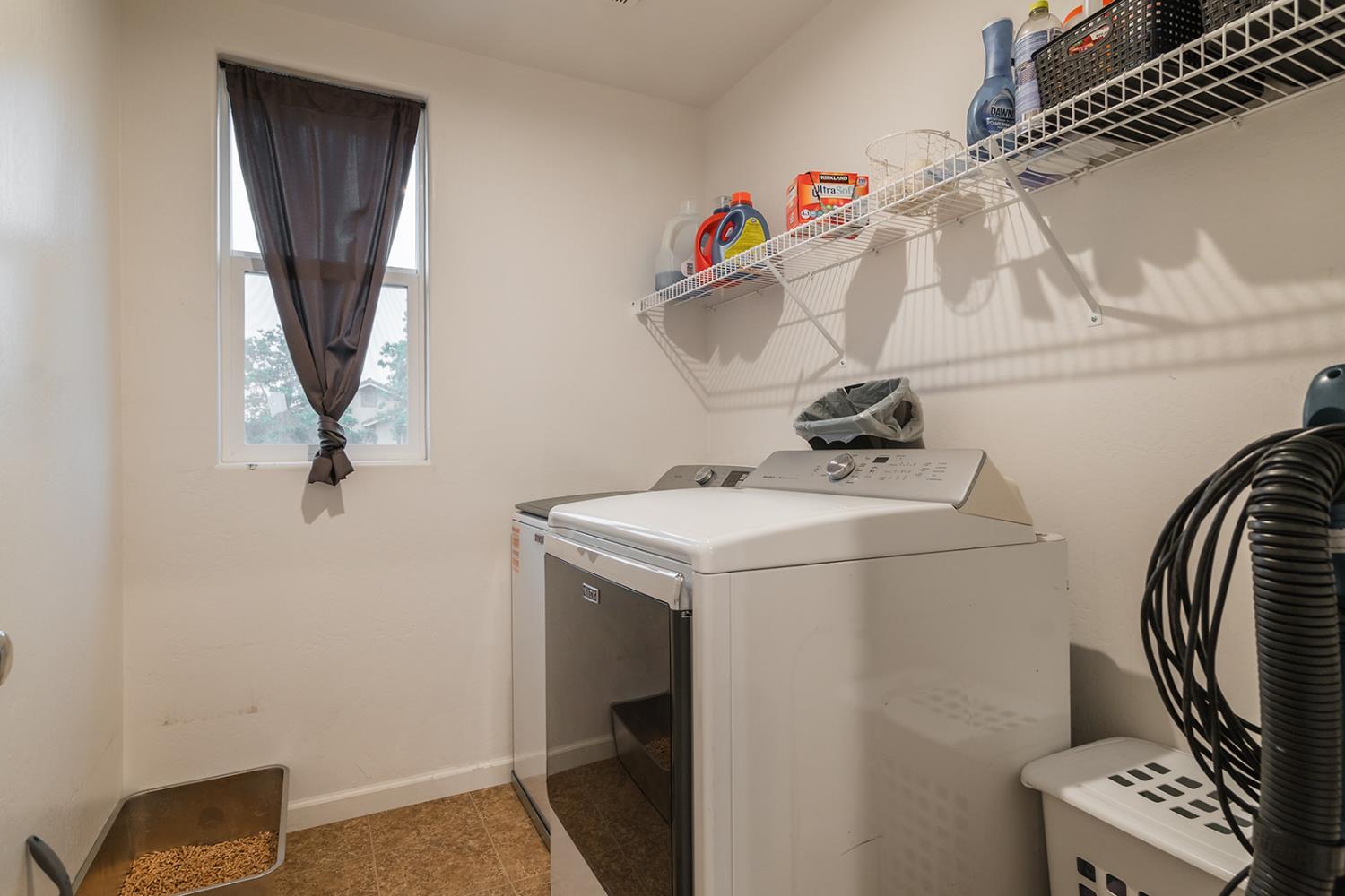 1945 East Gum Avenue Reedley, CA 93654 - Photo 21 of 31 a bathroom with a sink and a mirror