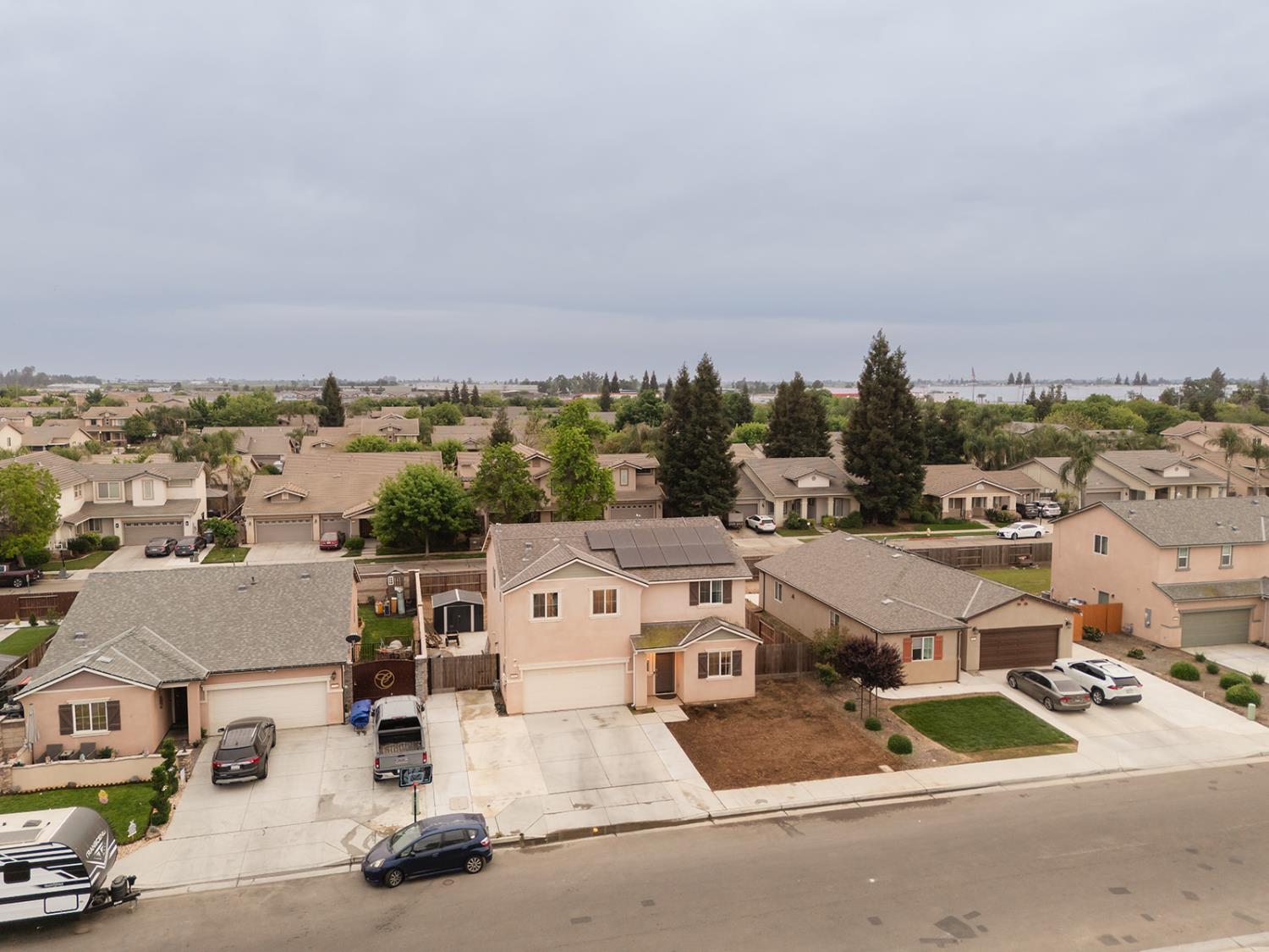1945 East Gum Avenue Reedley, CA 93654 - Photo 28 of 31 an aerial view of residential houses with city view