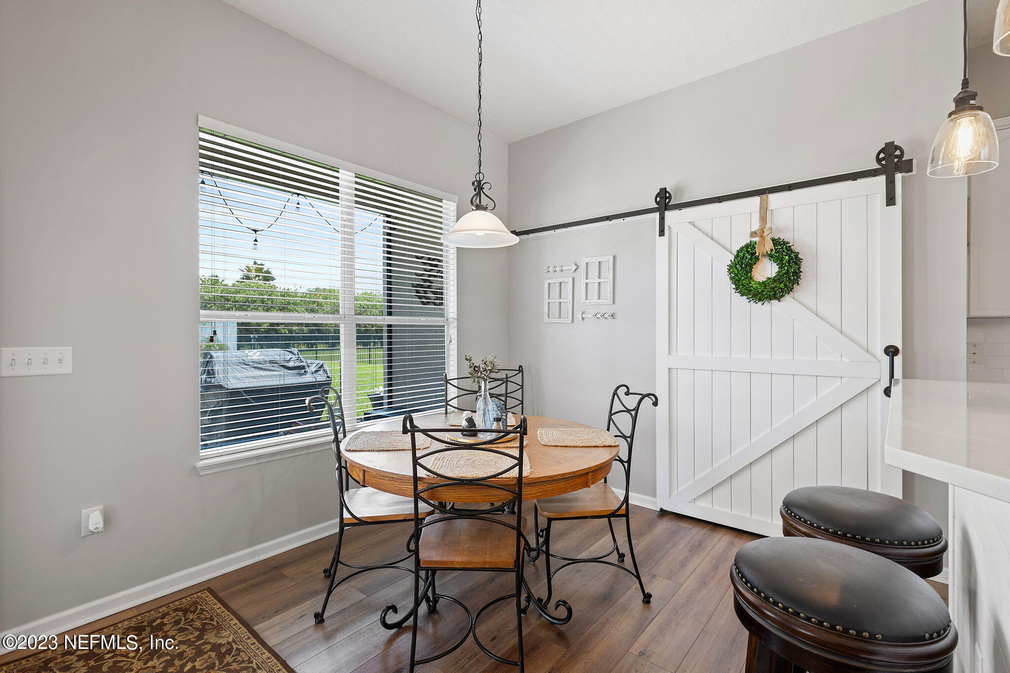 293 Porta Rosa Circle St. Augustine, FL 32092 - Photo 11 of 37 a dining room with furniture and wooden floor