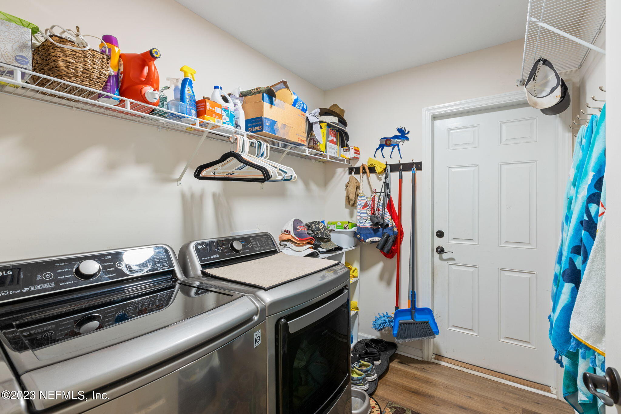 293 Porta Rosa Circle St. Augustine, FL 32092 - Photo 12 of 37 a view of walk in closet with clothes and shoes
